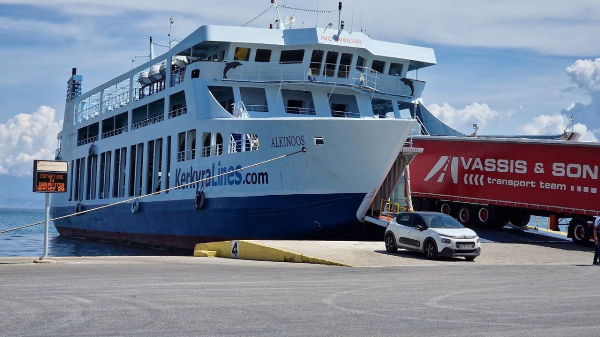 ferry being boarded at the port in corfu town