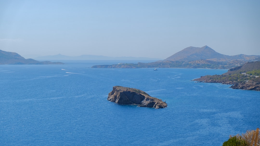A large body of water surrounded by mountains